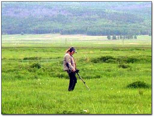 A Siberian Girl Metal Detecting