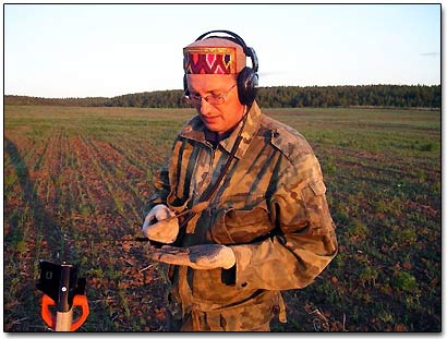 Sergei Checking His Finds