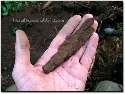 Digging Up Fragments of Artillery Projectile