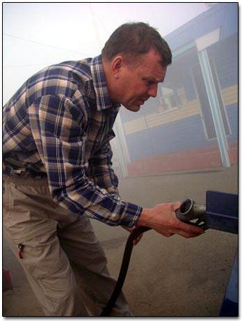 Andrei Filling Up the Gas Tank