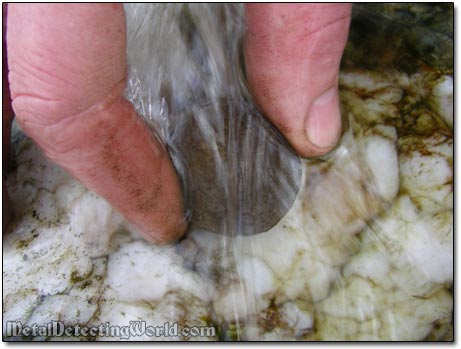 Rodney Washing His Find in Creek