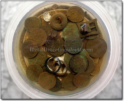 Soaking Dug Coins in Warm Soapy Water