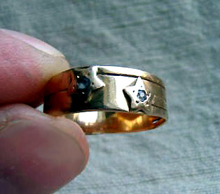 Gold Ring with Stars and Gems
