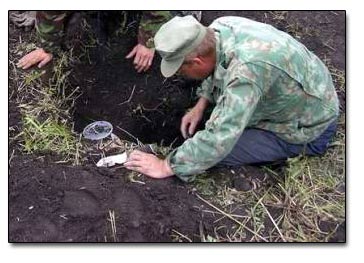 Eyeballing Single Coins In a Prospecting Hole