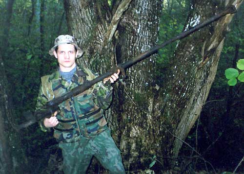 Holding Russian Antitank PTRD-41 Rifle's Barrel