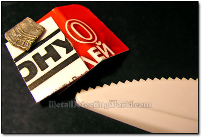 Use Plastic Knife To Unbend Silver Hammered Medieval Coin - Step 3