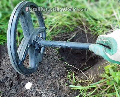 Pinpointing a Coin by the Coil's Heel