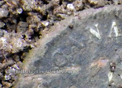 Visible Letters 'CANADA' with Traces of Silver on a Large Copper Coin