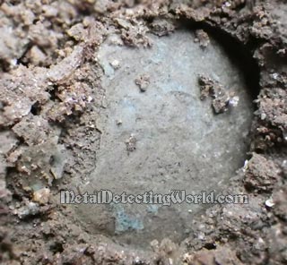 Imprint of Coin in Frozen Dirt