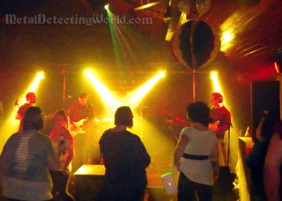 Rock Band Performing At Local Night Club 
