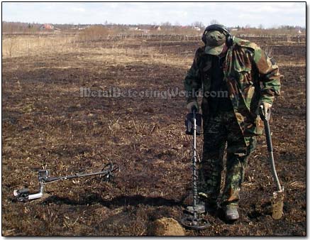 Metal Detecting on Burnt Grass Field